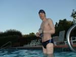 wearing a Nike black/blue speedo swim brief