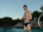 wearing a Nike black/blue speedo swim brief