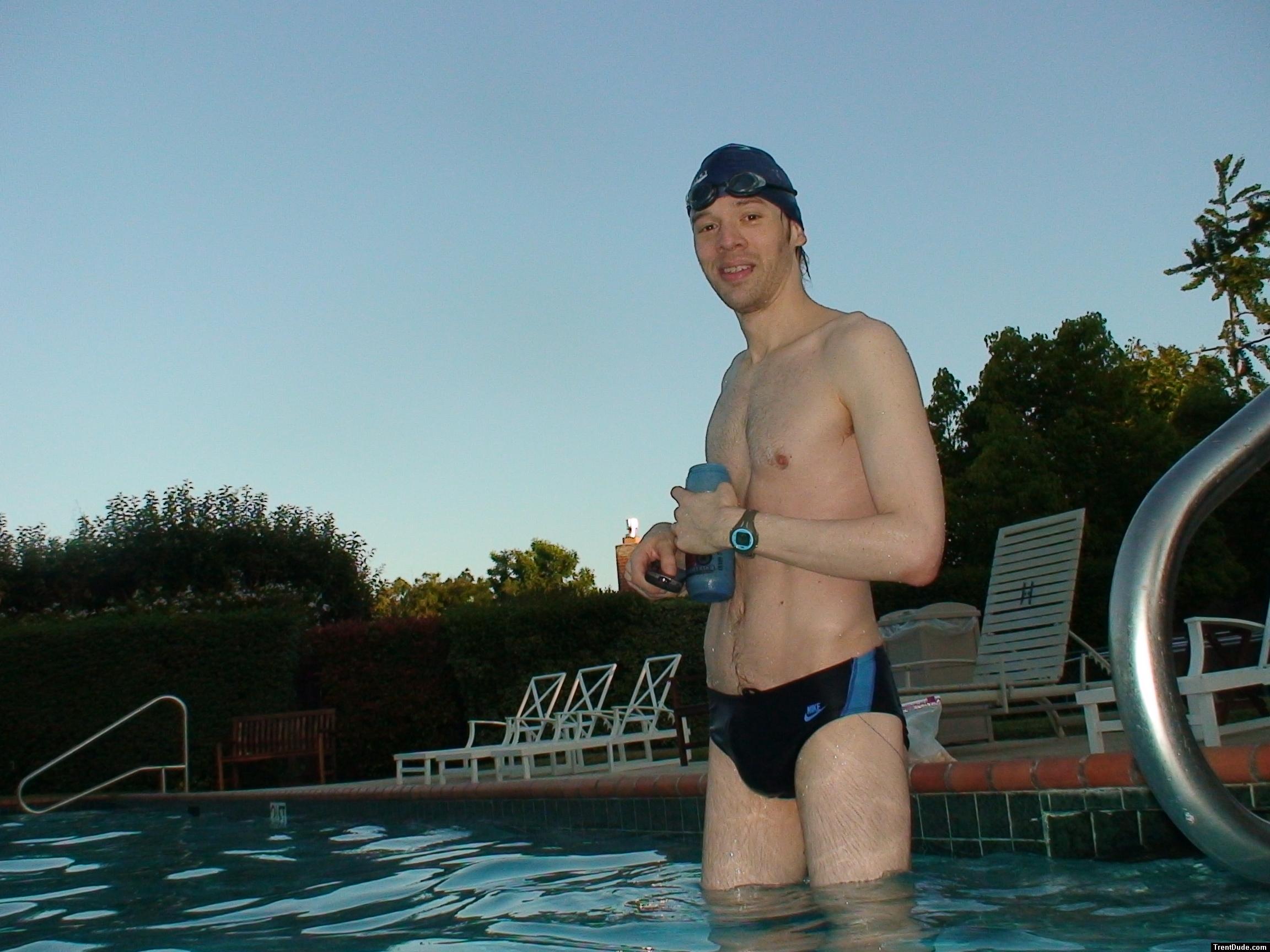 wearing a Nike black/blue speedo swim brief