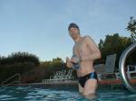 wearing a Nike black/blue speedo swim brief