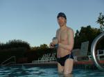 wearing a Nike black/blue speedo swim brief