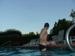 wearing a Nike black/blue speedo swim brief