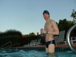wearing a Nike black/blue speedo swim brief