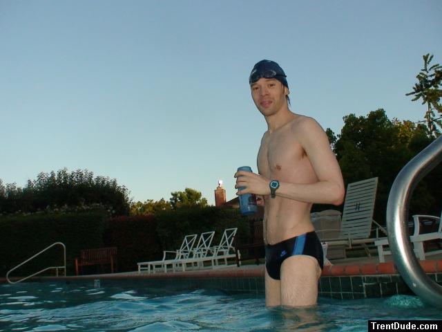 wearing a Nike black/blue speedo swim brief