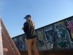 Brown sweats on train trestle, Oregon Research Helios sun hat, Christian Dior Monsieur Cashmere scarf (rear)