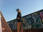 Brown sweats on train trestle, Oregon Research Helios sun hat, Christian Dior Monsieur Cashmere scarf