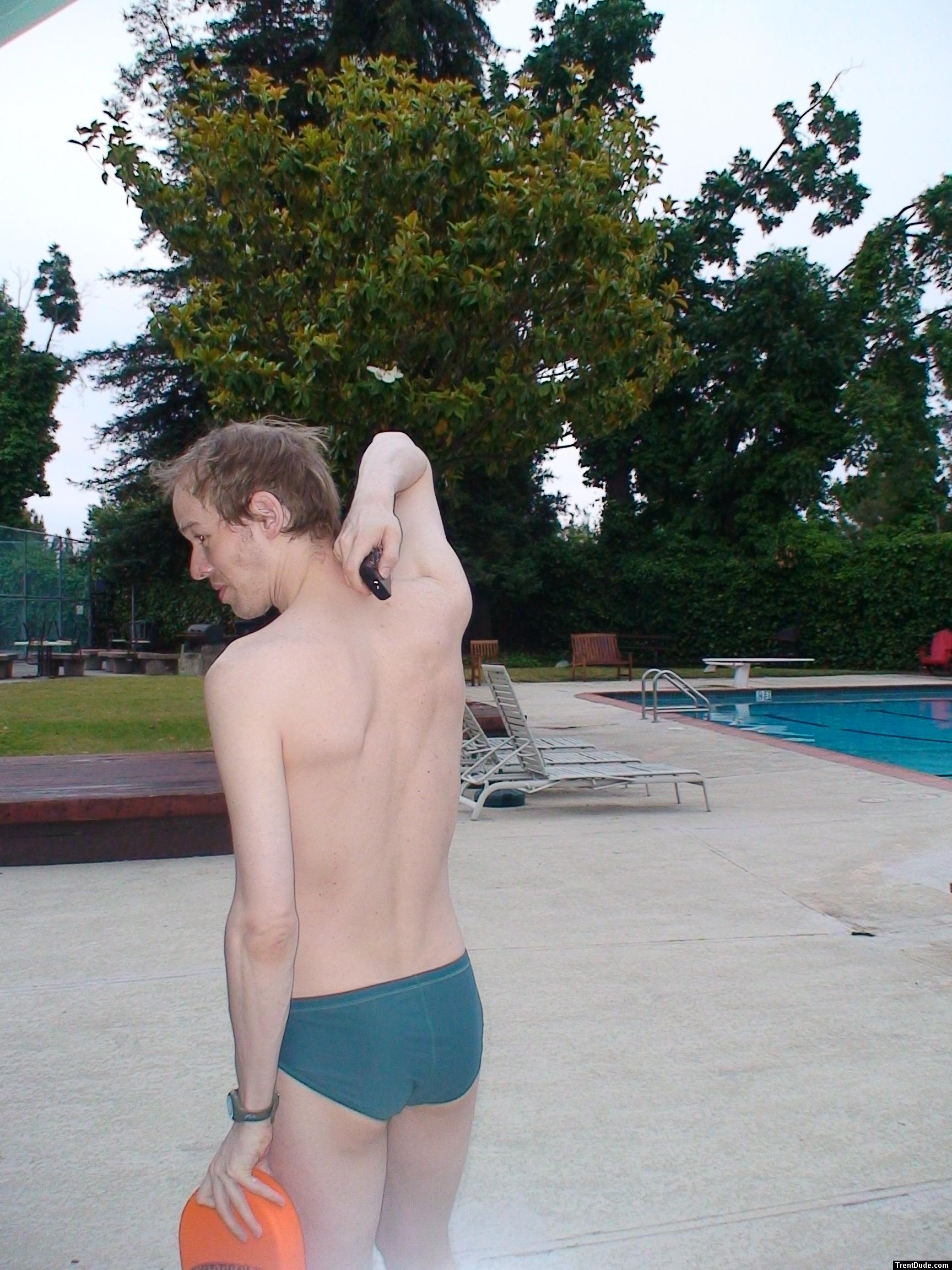 Trying out to be lifeguard (in a green Nike speedo swim brief) (rear) (back) best