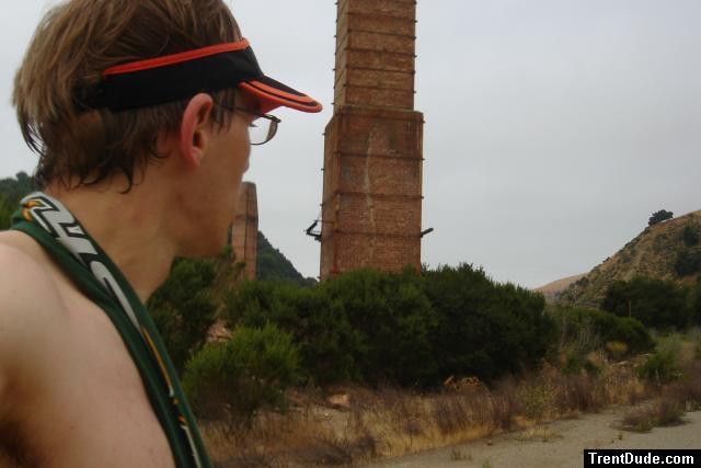 Shirtless in a abandoned brick yard
