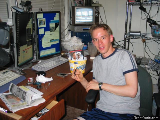 grey t-shirt at the computer