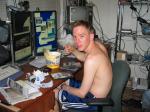 college guy watching DVDs