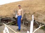 Shirtless in blue sweats