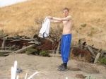 skinny dude pulls off shirt