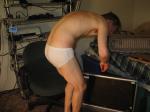 Bending over to inspect New TV set
