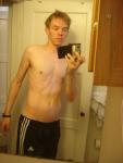shirtless in track pants