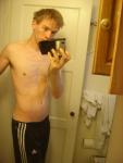 shirtless in track pants