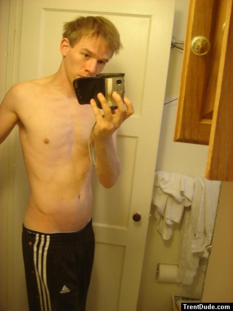 shirtless in track pants