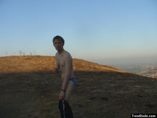 before sunrise in a blue string bikini