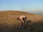 Putting on shoes to escape the rising sun