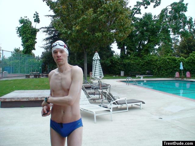 Blue Nike speedo, white swim cap