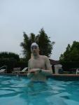 Blue Nike speedo, white swim cap