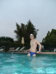 Blue Nike speedo, white swim cap