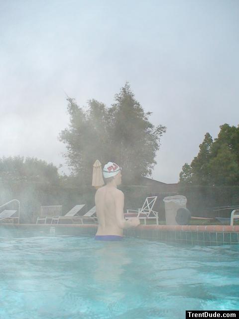 Blue Nike speedo, white swim cap