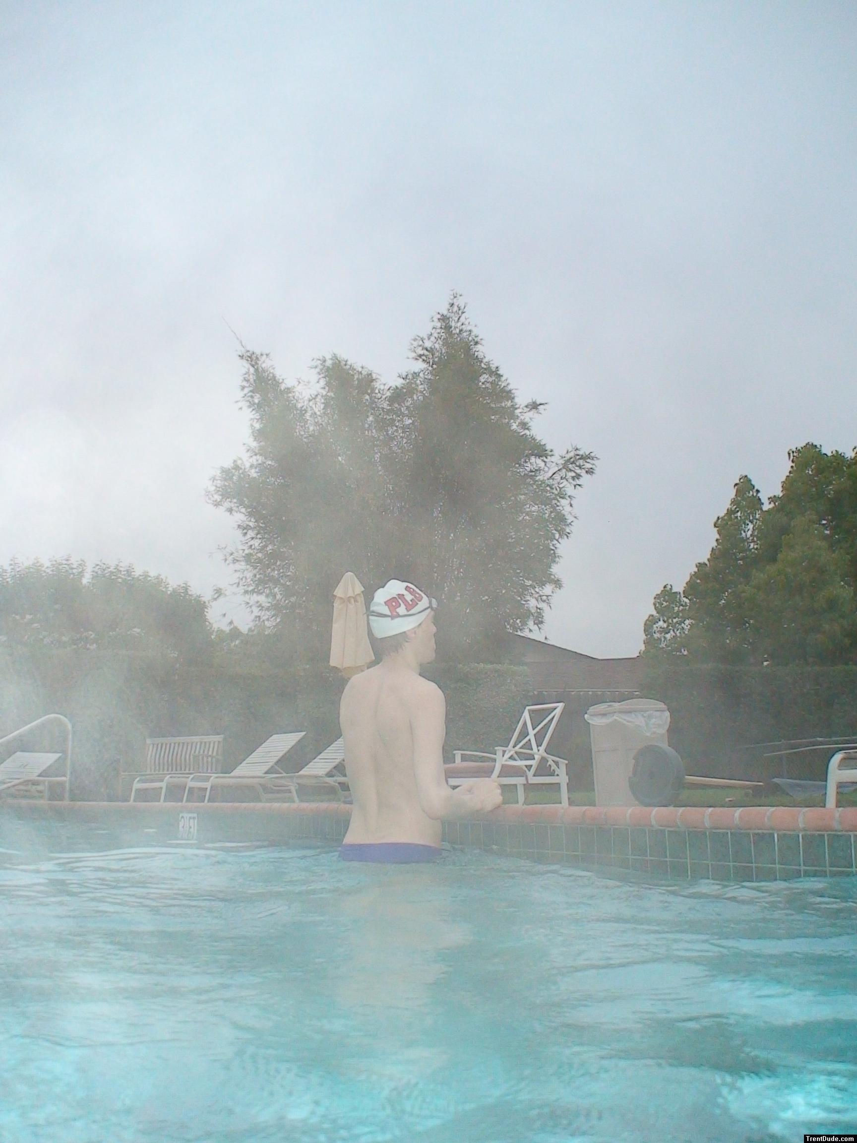 Blue Nike speedo, white swim cap