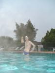 Blue Nike speedo, white swim cap
