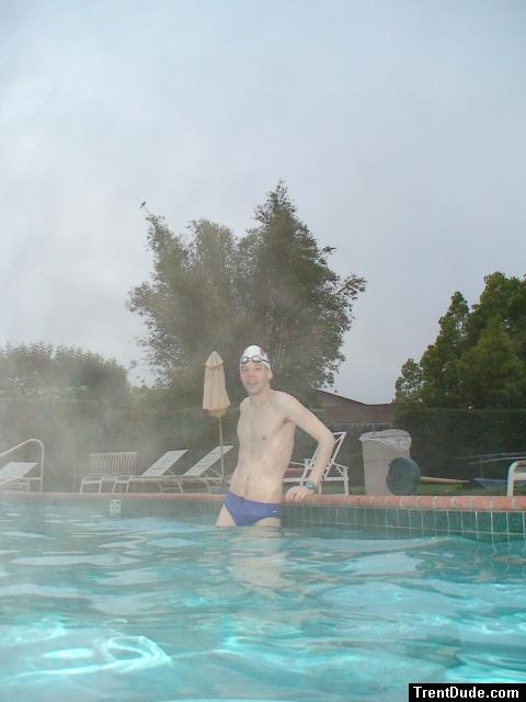 Blue Nike speedo, white swim cap