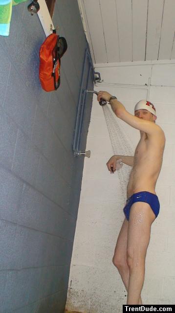 Blue Nike speedo, white swim cap