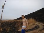 Trent hiker in burned Montana Grassland (i Didn't start that fire) (cooling off in undies on a hot day)