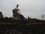 Hiker sitting on rock in white hanes underwear