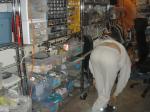 bending over (dressed)