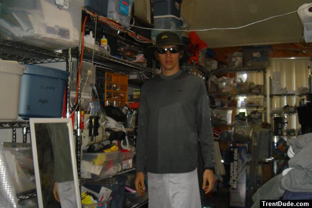 Standing with grey Nike exercise shirt