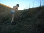 Tommy Hilfiger action brief underwear near a fence