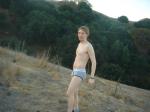 On a hillside in Tommy Hilfiger action brief underwear
