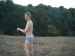 On a hillside in Tommy Hilfiger action brief underwear (back side)