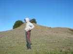 wearing Addidas Nylon sweat pants and sweatshirt in a field
