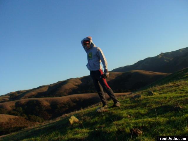 Addidas nylon biking tights and a sweatshirt during a morning sunrise in the mountains