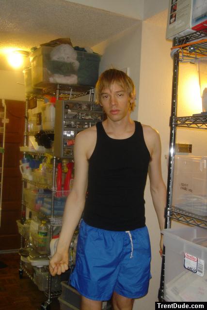 showing muscles in a muscle shirt