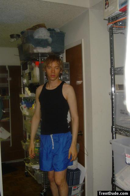 trying to look like a guy in a muscle shirt