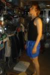 Looking up in a black tanktopr (for sale) and blue lycra shorts