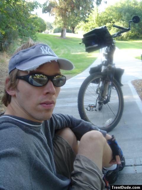 Taking a rest with the bike in a park