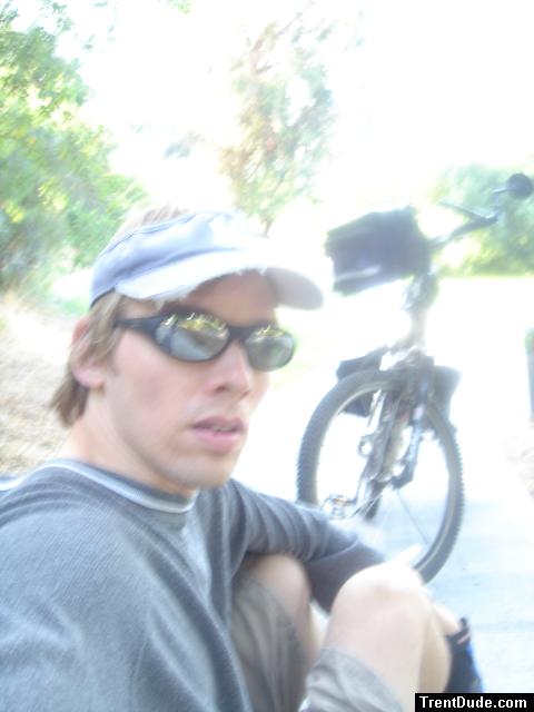 Taking a rest with the bike in a park