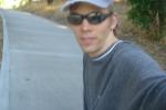 Black Ray Ban sunglasses, unshaven