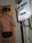 Getting ready to shower, backside, wearing red hanes briefs, neck, back