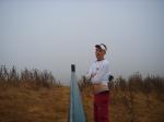 Hanes red underwear and 49'ers sweats near a fence in the fog