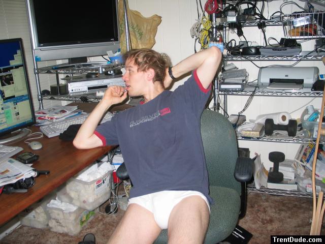 Sitting in Tightey Whiteys at the computer being watched!