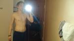 Shirtless in a hotel room