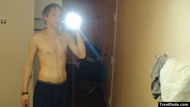 Shirtless in a hotel room